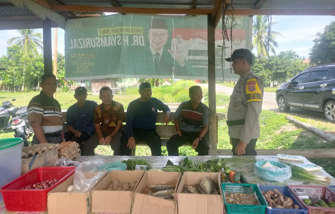 Polsek Bukit Batu Ajak Warga Desa Tenggayun Wujudkan Pilkada Aman dan Kondusif