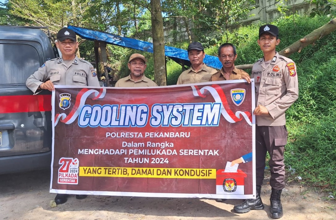 Tingkatkan Partisipasi Warga, Sat Binmas Polresta Pekanbaru Gencar Gelorakan Pilkada Damai