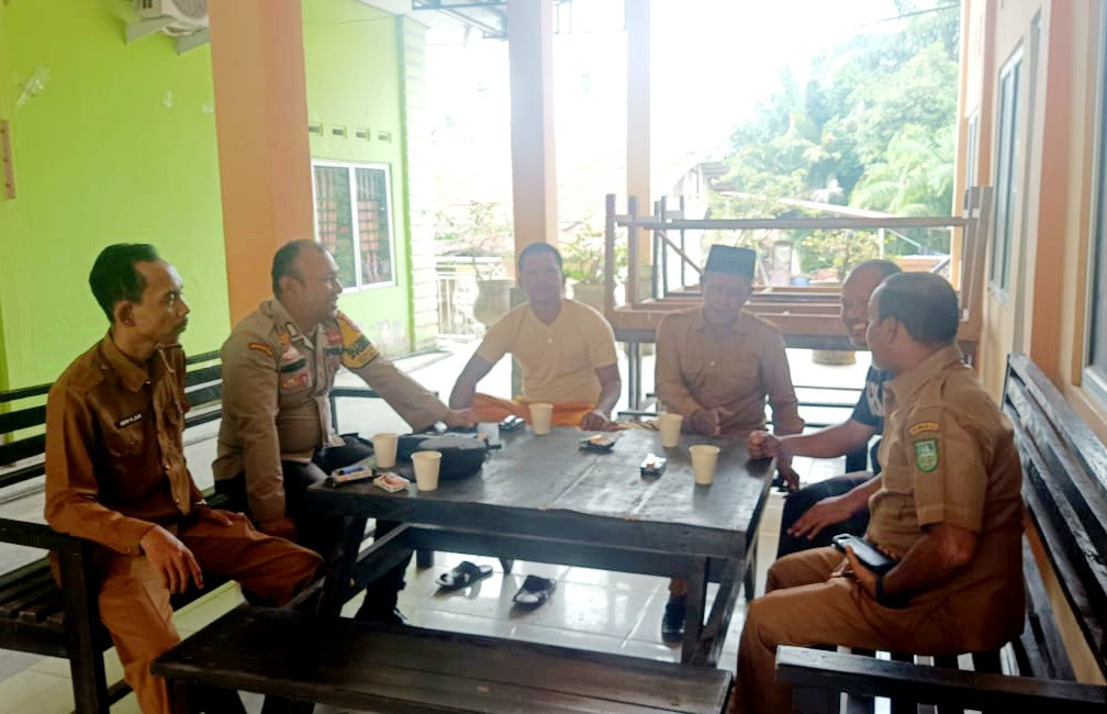 Polsek Mandau Giat Cooling System Bersama Perangkat Desa, Berikan Pesan Kamtibmas Jelang Pilkada 2024
