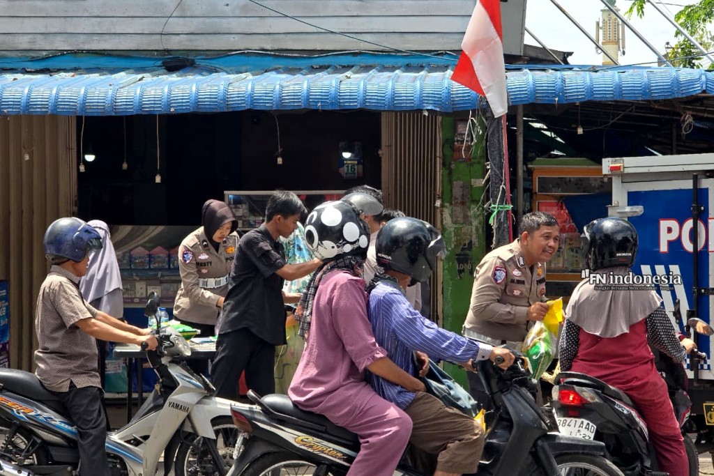 Gerakan Pangan Murah, Ditlantas Polda Riau Bantu Masyarakat Pekanbaru dengan 2 Ton Beras