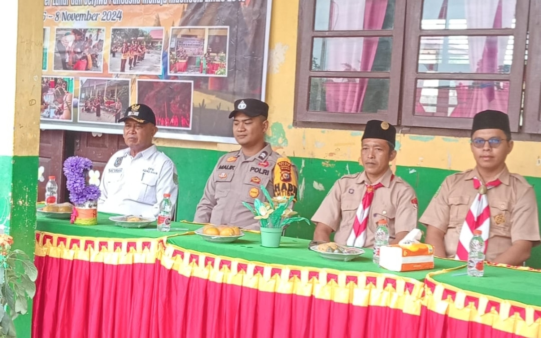 Bhabinkamtibmas Polsek Kerinci Kanan Hadiri Upacara Pembukaan Pesta Siaga Pramuka di SD Negeri Kampung Buatan Baru