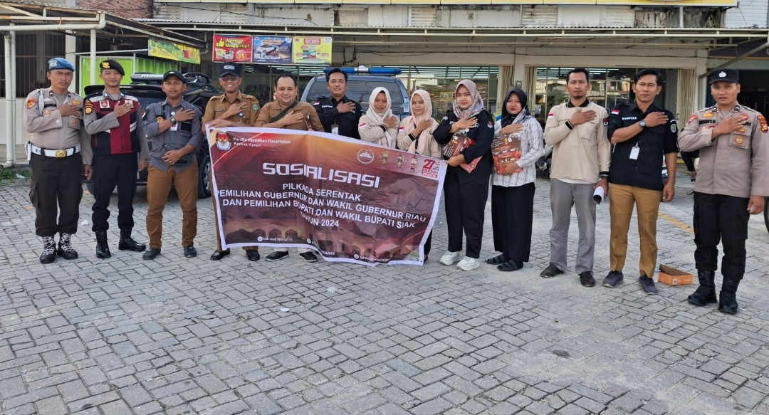 Polsek Kerinci Kanan Monitoring Sosialisasi Pilkada Serentak 2024 di Pasar Selasa Simpang Amir